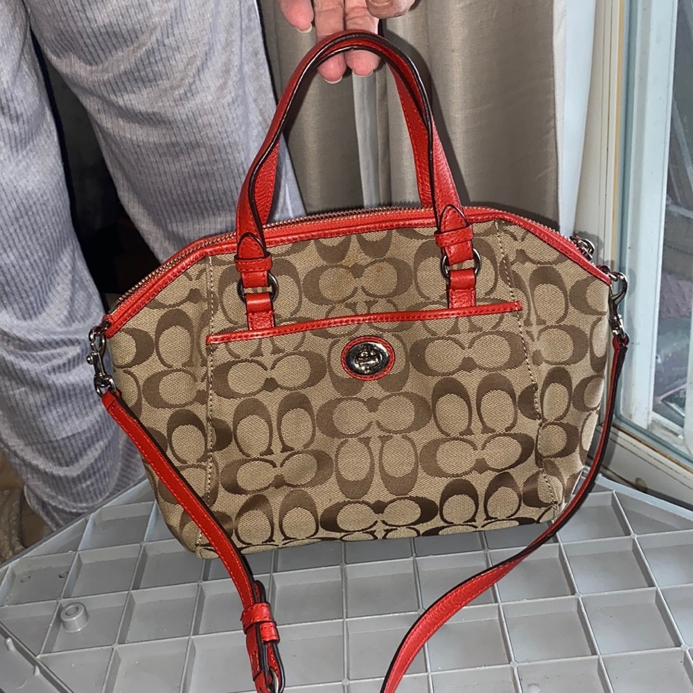 Red and tan coach purse